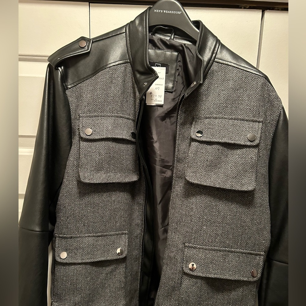 Faux leather sleeves & accents brand new !